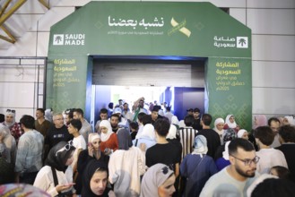 Saudi companies showcase products and investments inside the Saudi pavilion at the Damascus