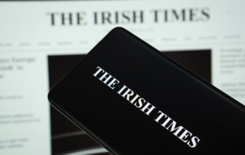 Dhaka, Bangladesh - 18 March 2025: The logo of The Irish times is displayed on a smartphone screen,