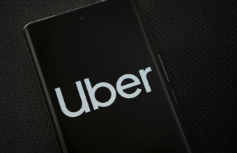 Dhaka, Bangladesh - 17 March 2025: The logo of the Uber is displayed on a smartphone screen