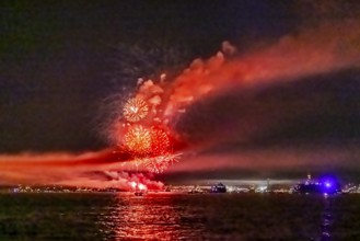 Lake Night Festival Constance. Water fireworks over the German shore and the neighbouring Swiss