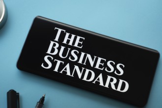 Dhaka, Bangladesh - 18 March 2025: The logo of The business standard is displayed on a smartphone