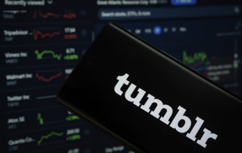 Dhaka, Bangladesh- 08 Aug 2025: Tumblr logo is displayed on a smartphone screen, with a stock graph