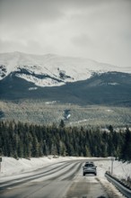 Winter road trip on the Icefields Parkway with lots of snow and ice, Banff National Park, Jasper