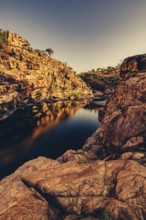 Bell Gorge waterfall, a body of water in north-west Australia in the Kimberley. Sunrise in the