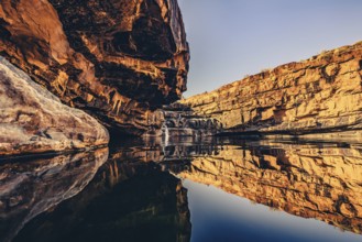 Bell Gorge waterfall, a body of water in north-west Australia in the Kimberley. Sunrise in the