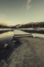 Lake Staz near Sankt Moritz in the Engadin in Switzerland. Morning atmosphere with fog in autumn.