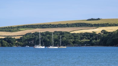 Boats on sea over Knoll Beach Studland, Poole, Dorset, England, United Kingdom