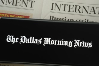 Dhaka, Bangladesh - 18 March 2025: The logo of The Dallas Morning News is displayed on a smartphone