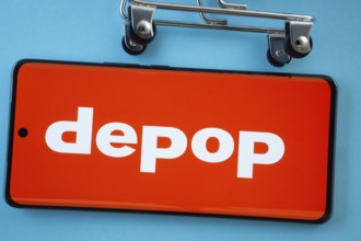 Dhaka, Bangladesh- 03 July 2025: Smartphone screen showing the Depop logo with shopping cart wheels