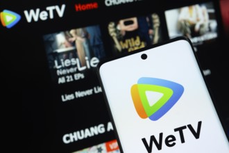 Dhaka, Bangladesh- 28 July 2025: WeTV logo is displayed on a smartphone screen, with the website is