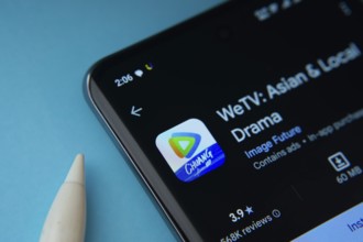 Dhaka, Bangladesh- 28 July 2025: WeTV app from Google Playstore is displayed on a smartphone screen