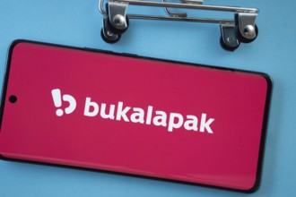 Dhaka, Bangladesh- 03 July 2025: Smartphone screen showing the Bukalapak logo with shopping cart