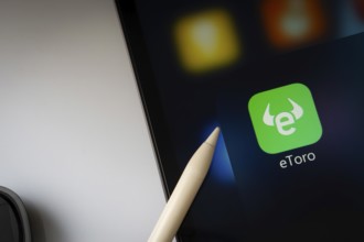 Dhaka, Bangladesh- 22 June 2025: A close up of an iPad screen displaying the eToro app