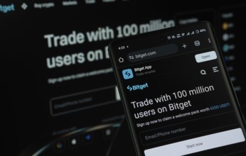 Dhaka, Bangladesh - 27 July 2025: The logo of Bitget is displayed on a smartphone screen, and the