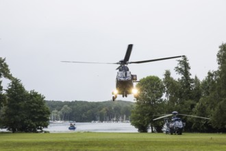 A helicopter with Emmanuel Macron (President of the French Republic) on board in front of a joint