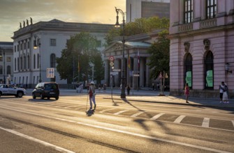 Road traffic and pedestrians on the carriageway in Berlin-Mitte, Unter den Linden, Berlin, Germany