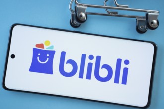 Dhaka, Bangladesh- 03 July 2025: Smartphone screen showing the Blibli logo with shopping cart