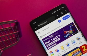 Dhaka, Bangladesh- 23 June 2025: A smartphone displaying the Blibli website with a shopping cart is