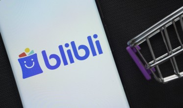 Dhaka, Bangladesh- 03 July 2025: A smartphone displaying the Blibli logo next to a miniature