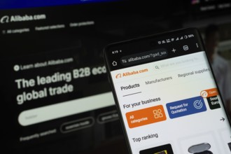 Dhaka, Bangladesh- 03 July 2025: Smartphone displaying Alibaba web interface against Alibaba