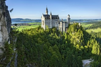 Neuschwanstein Castle by King Ludwig II above the Pöllat Gorge, fairytale castle in the