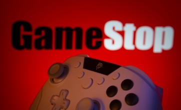 Dhaka, Bangladesh- 15 July 2025: A close-up of a gamepad with the GameStpo seen on screen in the