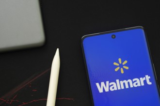 Dhaka, Bangladesh - 15 July 2025: The logo of the Walmart is displayed on a smartphone screen