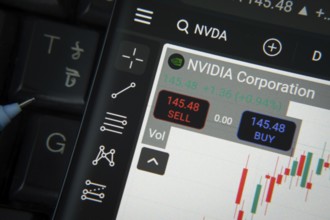 Dhaka, Bangladesh- 20 June 2025: Nvidia corporation stock trading details on smartphone over a