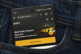 Dhaka, Bangladesh- 15 June 2025: A smartphone displaying the Bybit web interface peeks out of a