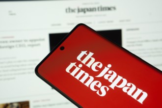 Dhaka, Bangladesh - 18 March 2025: The logo of the japan times is displayed on a smartphone screen,