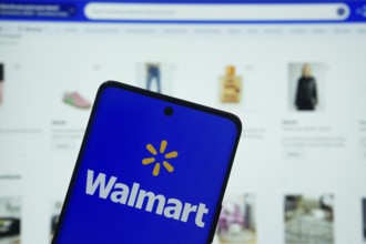 Dhaka, Bangladesh- 15 July 2025: Walmart logo is displayed on a smartphone screen, with the website