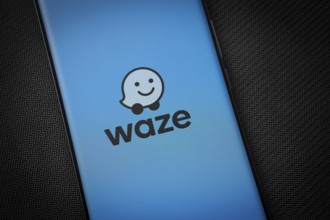 Dhaka, Bangladesh - 13 March 2025: The logo of the waze is displayed on a smartphone screen