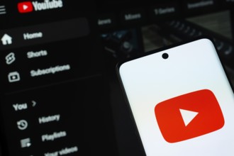 Dhaka, Bangladesh- 10 July 2025: Youtube logo is displayed on a smartphone screen, with the website