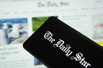 Dhaka, Bangladesh - 18 March 2025: The logo of The Daily Star is displayed on a smartphone screen,