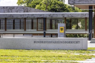 Federal Constitutional Court (BVerfG) . Exterior view with official sign and federal eagle.