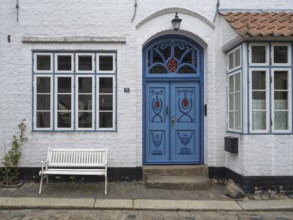 Beautiful ornate door mullion window, facade, old town, Husum, North Frisia, Schleswig-Holstein,