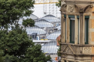 Stuttgart 21. construction site at the new through station. A glass roof construction provides the