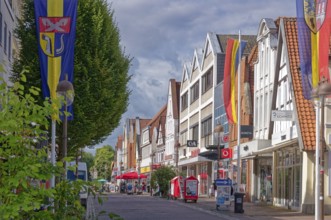 Buildings and shops in Lange Straße in the historic old town centre of Nienburg an der Weser.