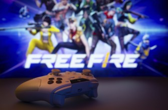 Dhaka, Bangladesh- 03 July 2025: A close-up of a white gamepad with the Garena Free Fire seen on