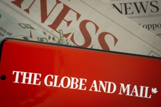 Dhaka, Bangladesh - 18 March 2025: The logo of The Globe And Mail is displayed on a smartphone