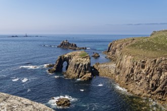 Rock formation and rock gate off the west coast of England in the Atlantic Ocean. Land's End, the