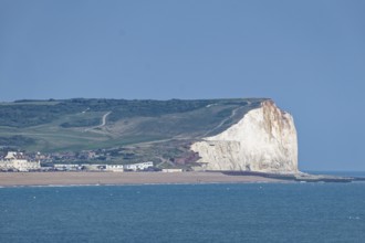 Beach and pier in Eastbourne, seaside resort on the English Channel, in the county of East Sussex,