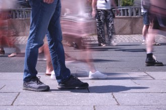 Passers-by in a summer city, shopping, Germany