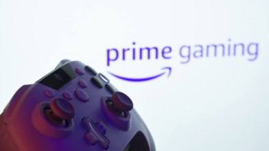 Dhaka, Bangladesh- 22 June 2025: A close-up of a white gamepad with the Prime Gaming seen on screen