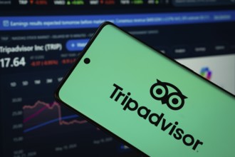 Dhaka, Bangladesh- 22 June 2025: Tripadvisor logo is displayed on a smartphone screen, with a stock