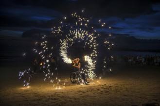 Fire show, jugglers with fire, wheelchair users, Ao Nang Beach, sunset, Ao Nang, Krabi, Thailand