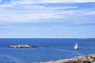 Archipelago with sailing boats off the coast of Lysekil, Bohuslän, Västra Götalands län, Sweden,