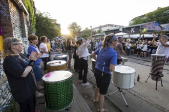 The band Berlin Percussion plays on the RAW grounds as part of the Fête de la Musique. The music