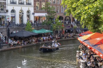 The old town centre of Utrecht, Oudegracht, around 2 km long with many old houses, shops,