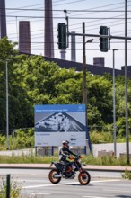 Construction site sign for thyssenkrupp Steel's first direct reduction plant, the climate-neutral